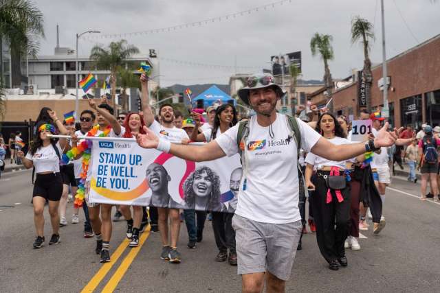 Daniel Kasprowicz leads UCLA Health staff walking in the 53rd annual LA Pride Parade on Sunday
