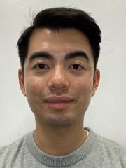 A headshot of Justin Lau