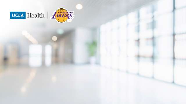 Zoom background of a hospital hallway and the UCLA Health logo and Lakers logo
