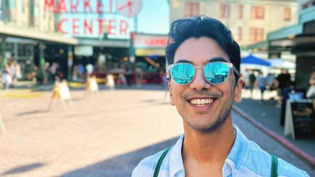 Neil Shaw, MD in front of Public Market Center