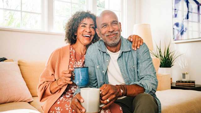 Older couple sitting on couch