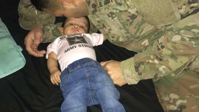 Army dad with baby daughter