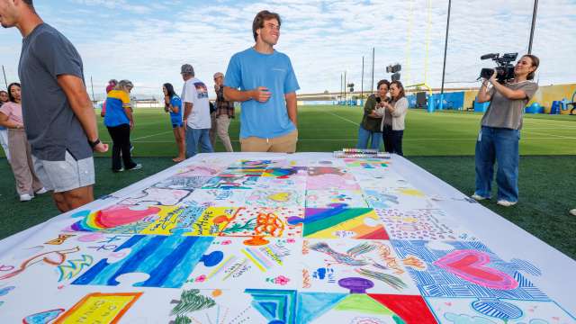 LA Chargers kicker Cameron Dicker with art therapy mosaic.