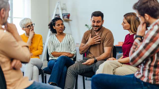 A man speaking in a support group