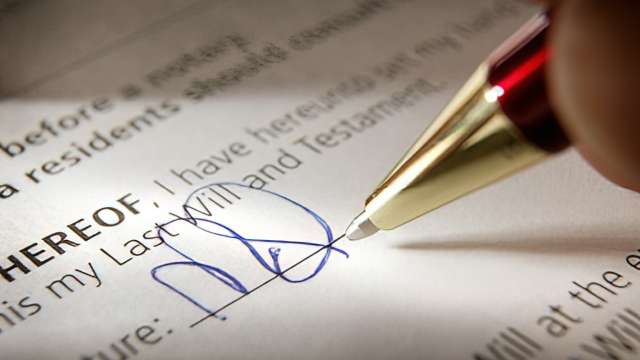 Person signing a form