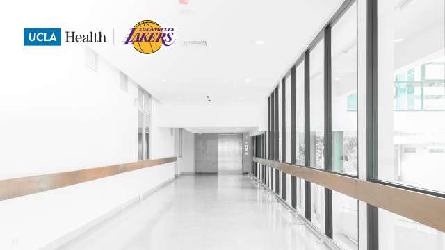 Zoom background of a hospital hallway with the UCLA Health Logo and Lakers Logo