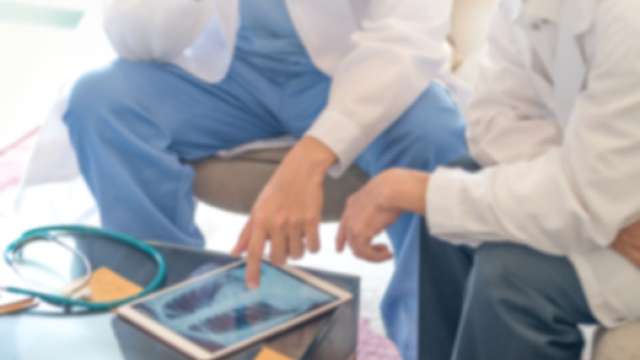 Doctors looking at x-ray