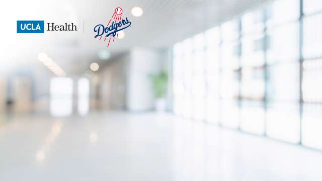 Zoom background of a hospital hallway and the UCLA Health logo and Dodger logo