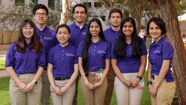 Mattel Youth Ambassadors standing together and smiling.