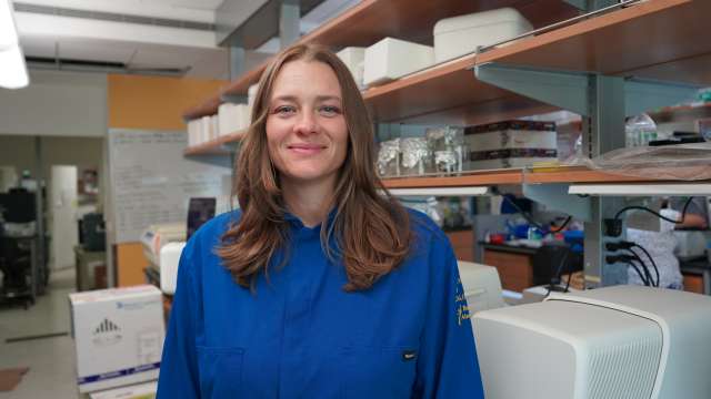 UCLA scientist Tara TeSlaa smiles in her lab.  