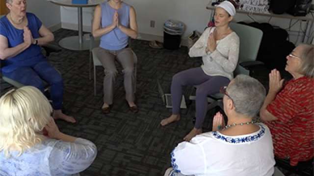 group singing in a circle