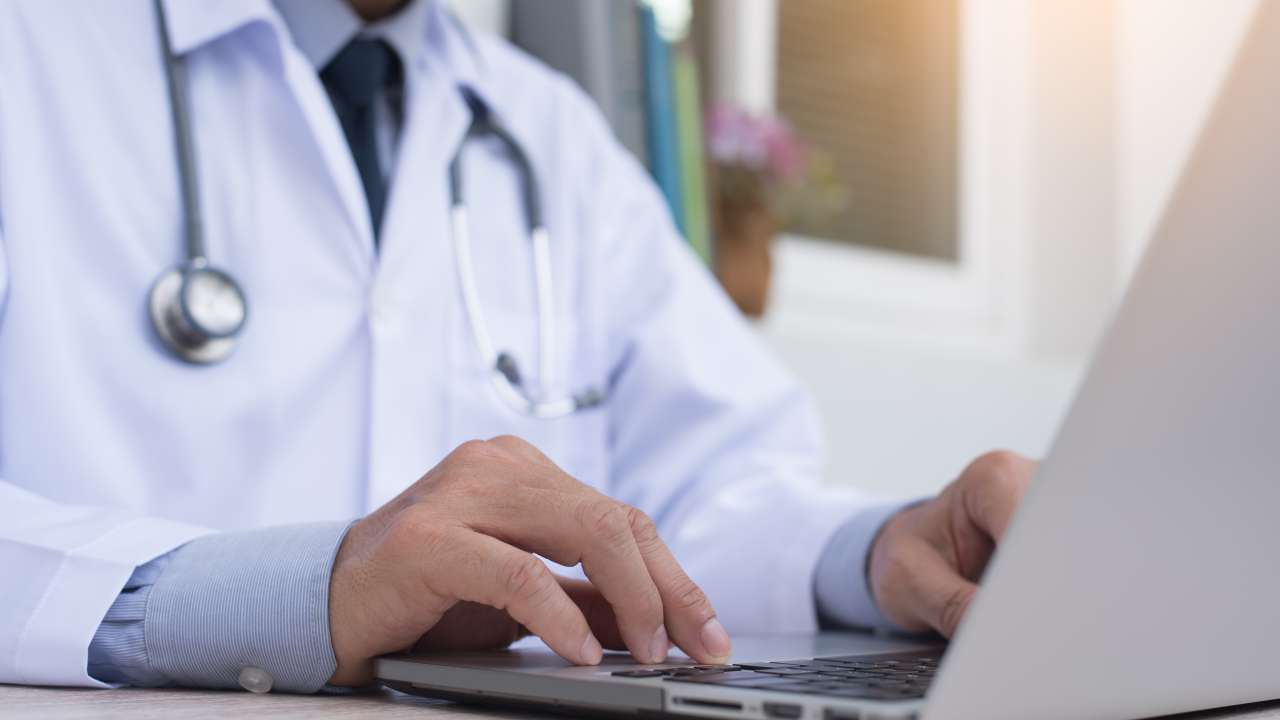 a hand and medical records