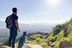 Niko Massaly, PhD hiking with his dog