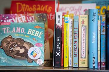 Amanda Penichet initially stocked her Inspiration Station book card with about 50 books. She figures she's purchased about 100 more since. 