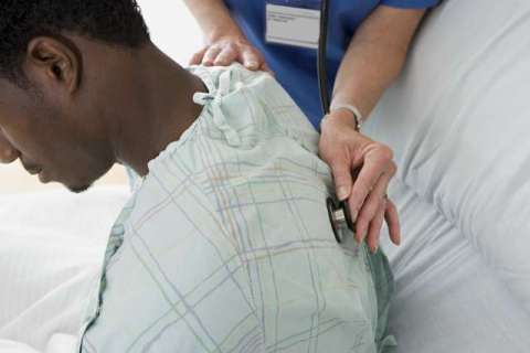 Man having examination in hospital.