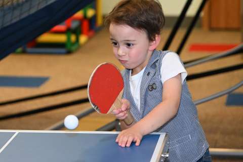 Jakob Guziak plays ping-pong