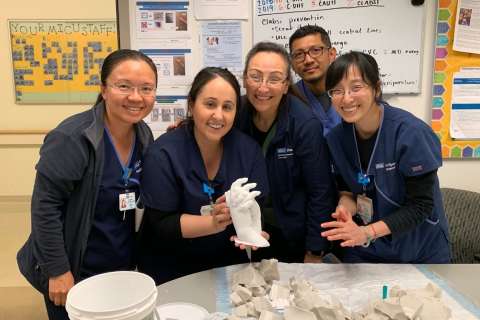 4ICU Nurses with a finished hand mold