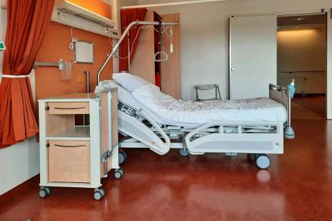 Empty hospital bed