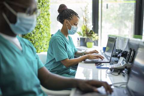 Nurse working at desk