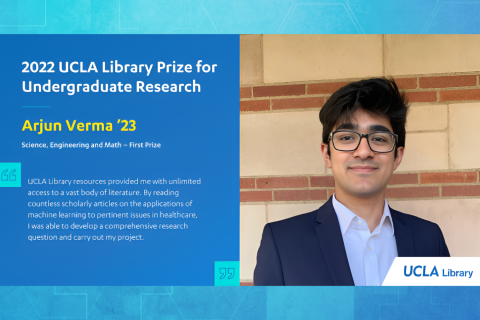 Arjun posing for the camera wearing a light blue button up shirt and a dark blue suit jacket, received the 2022 UCLA Library Prize for Undergraduate Research.