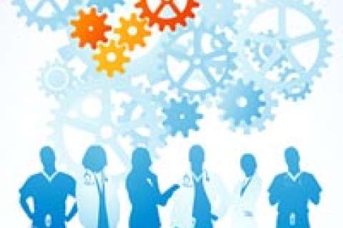 Medical team standing beneath gears