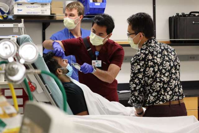Neurology residents participating in a stroke simulation