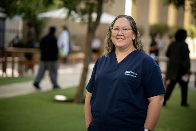 Nurse Amy Castillo in her blue UCLA Health uniform