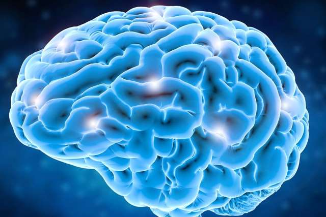 A bright blue, glowing visualization of a human brain shows several areas of activity represented by bright white sparks.