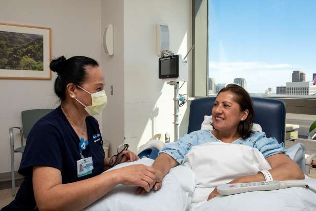 Nurse attending a patient in Ronald Reagan UCLA Medical Center