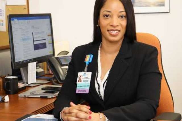 Dr. Quanna Batiste-Brown, Chief nursing officer, sitting at her desk