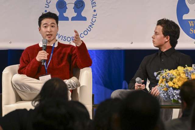 Social media influencers Eli Stone, left and Jacob Sartorius are on stage at the Gen Z Wellness Summit