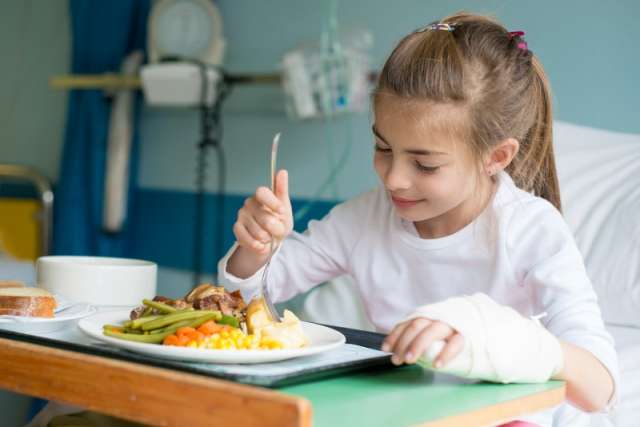 Pediatric patient eating in ICU