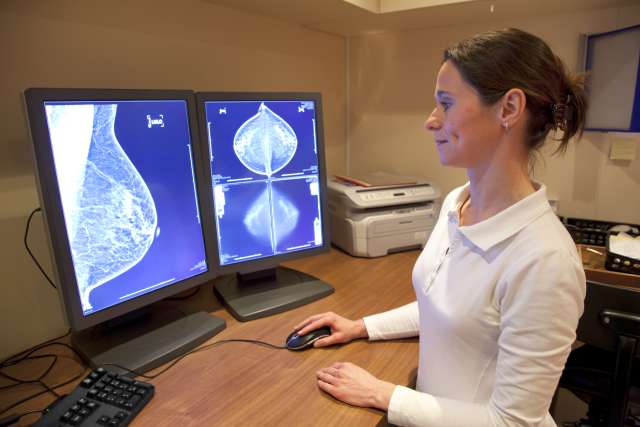 Woman reading a breast screening