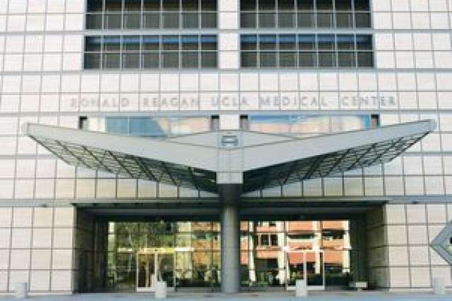 Entrance of Ronald Reagan UCLA Medical Center with modern architecture.