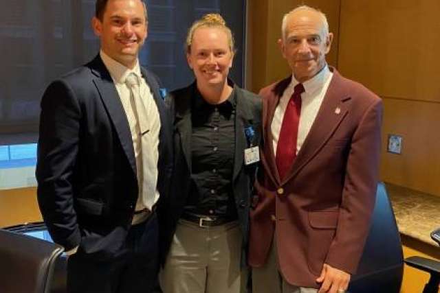  U.S. Army Capt. Trent Reece, left, with Anna Funk, a lieutenant commander in the U.S. Coast Guard and retired Major General David Rubenstein. (Photo courtesy of Capt. Reece)
