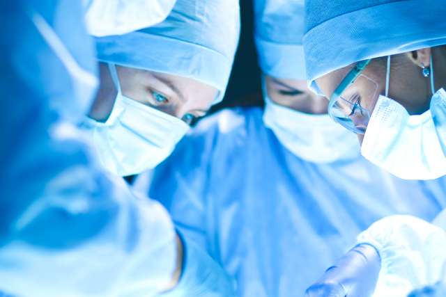 Cardiac surgeons doing surgery