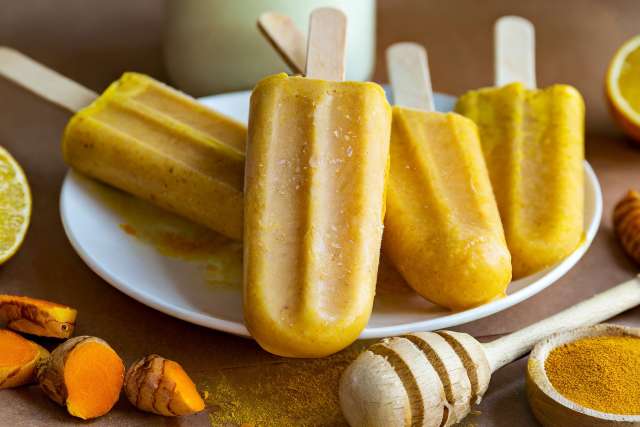 4 popsicles on a plate