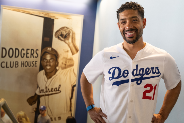 Kristofer Jones honored on Black Heritage Night at Dodger Stadium. Posing in the locker room