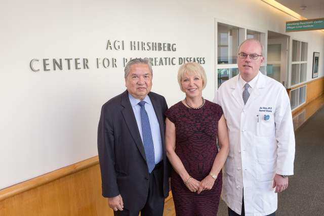 Agi Hirshberg, center, with Dr. Vay Liang Go, left, and Dr. O. Joe Hines, at the Agi Hirshberg Center for Pancreatic Diseases. (Photo by Reed Hutchinson/UCLA Health). 