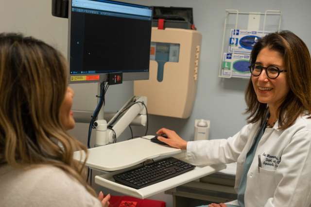 Dr. Sanaz Memarzdeh consulting with patient Grace Geaga