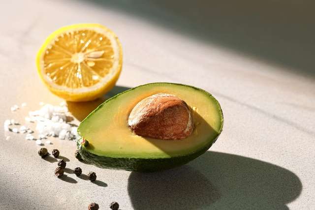 easy avocado half with lemon and salt and pepper