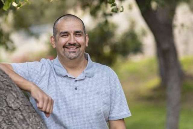 Lazaro Barajas was enrolled in a clinical trial testing the safety and efficacy of a novel combination immunotherapy. (Photo by Joshua Sudock/UCLA Health)