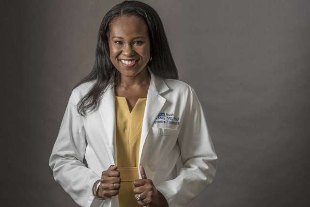 Dr. Fola May
