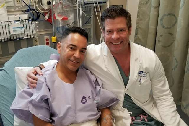 Dr. Jesse Mills with a patient recovery from testicular cancer treatment