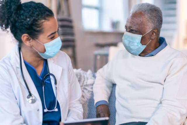 doctor having a conversation with a patient