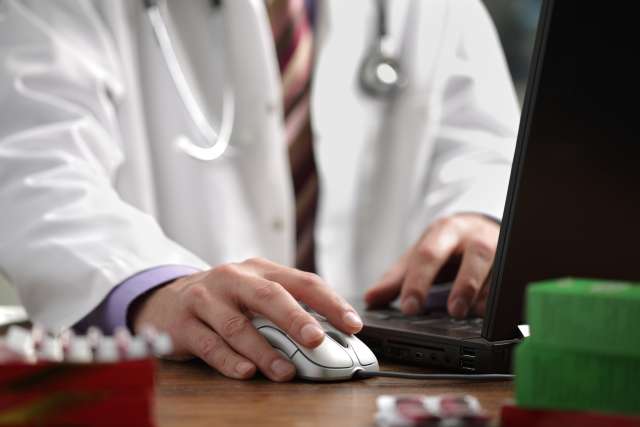 Doctor using mouse