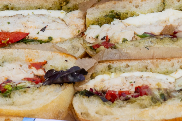 Two small stacks of sandwiches