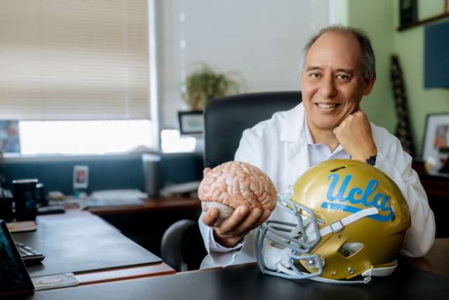 Dr. Giza with brain model