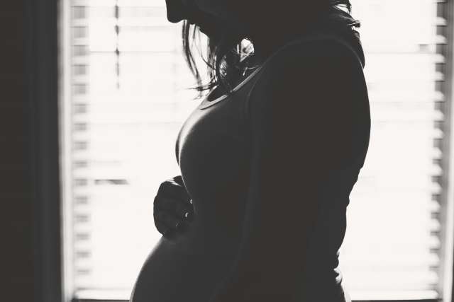 Pregnant woman in silhouette