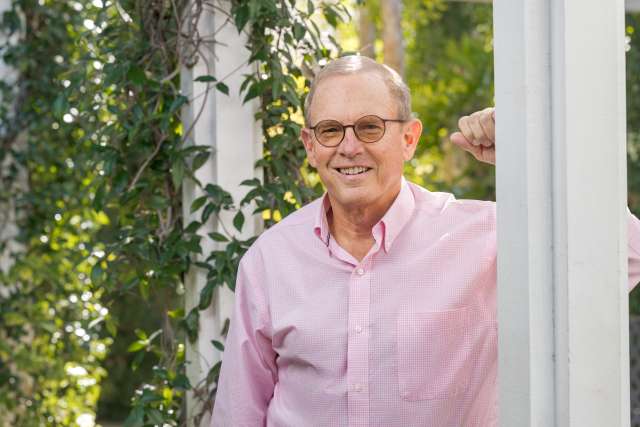 Chaplain Michael Eselun poses for a portrait at his home.